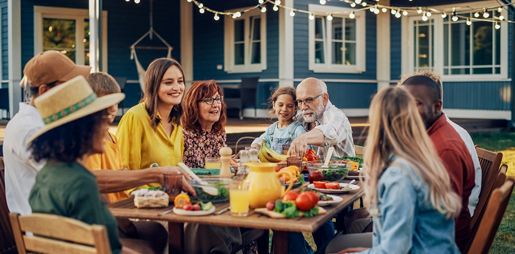Group of people around a picnic table